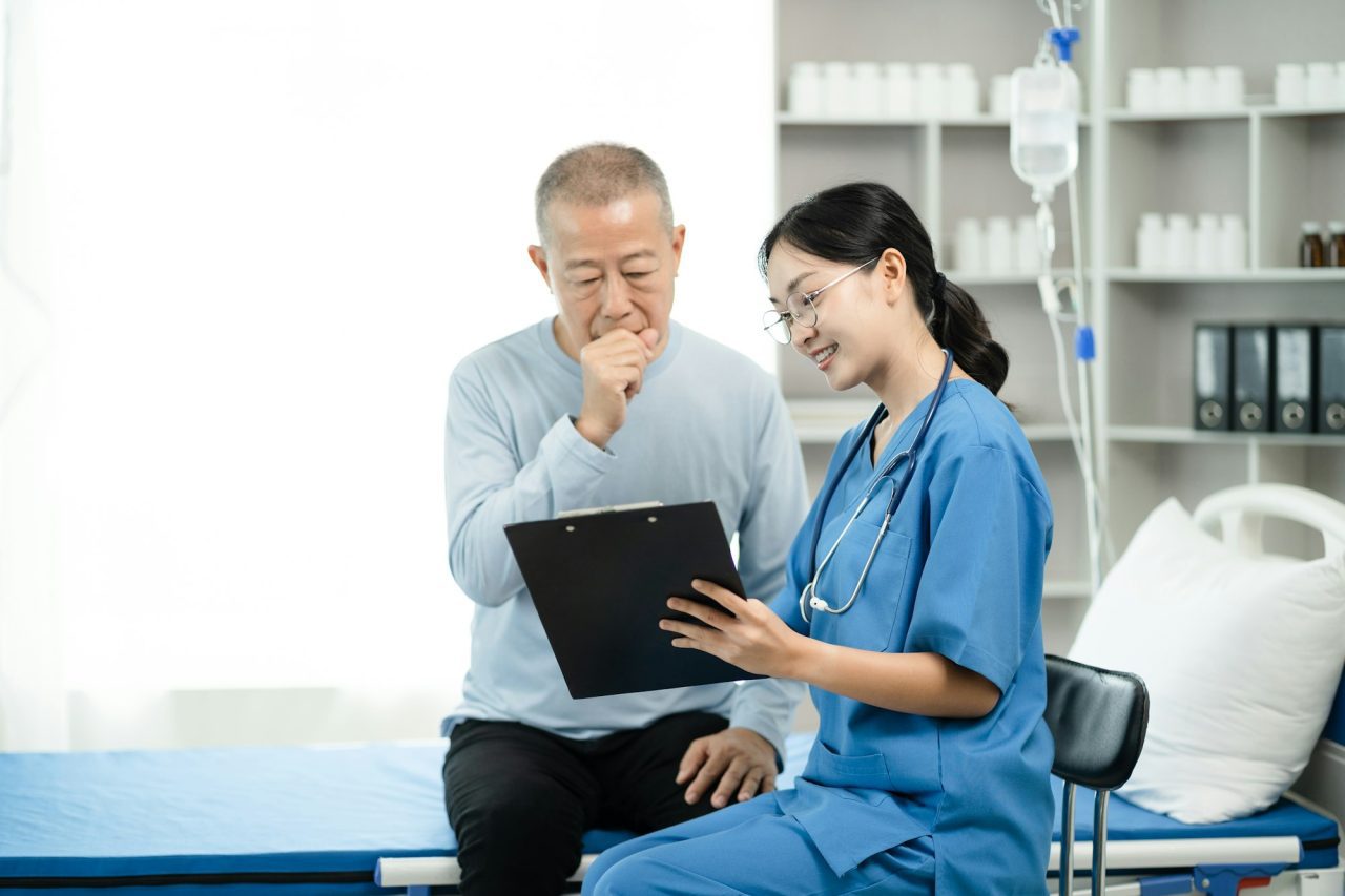 Concerned senior old patient, patient talks with healthcare professional.